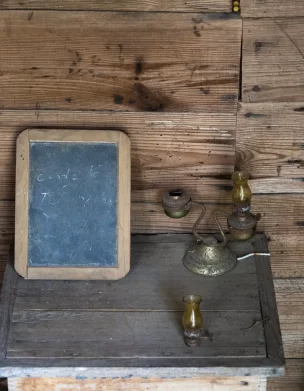A students desk from the Museum of Appalachia as seen in the Echoes episode